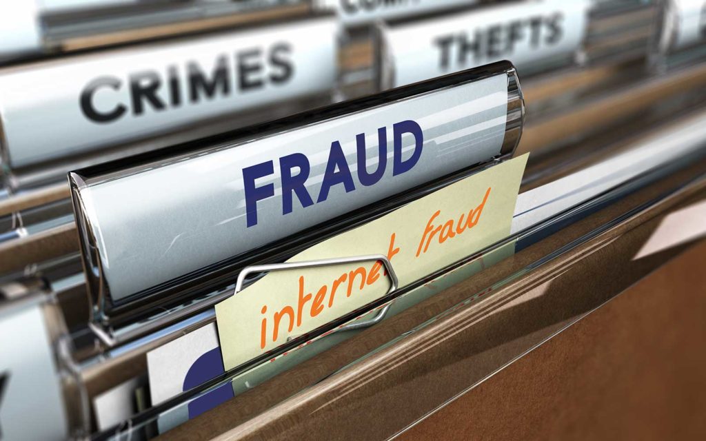 A close-up stock image of filing folders with categorization labels like "crimes," "thefts," "fraud" and "internet fraud" to illustrate the idea of reporting scam emails and other suspicious messages