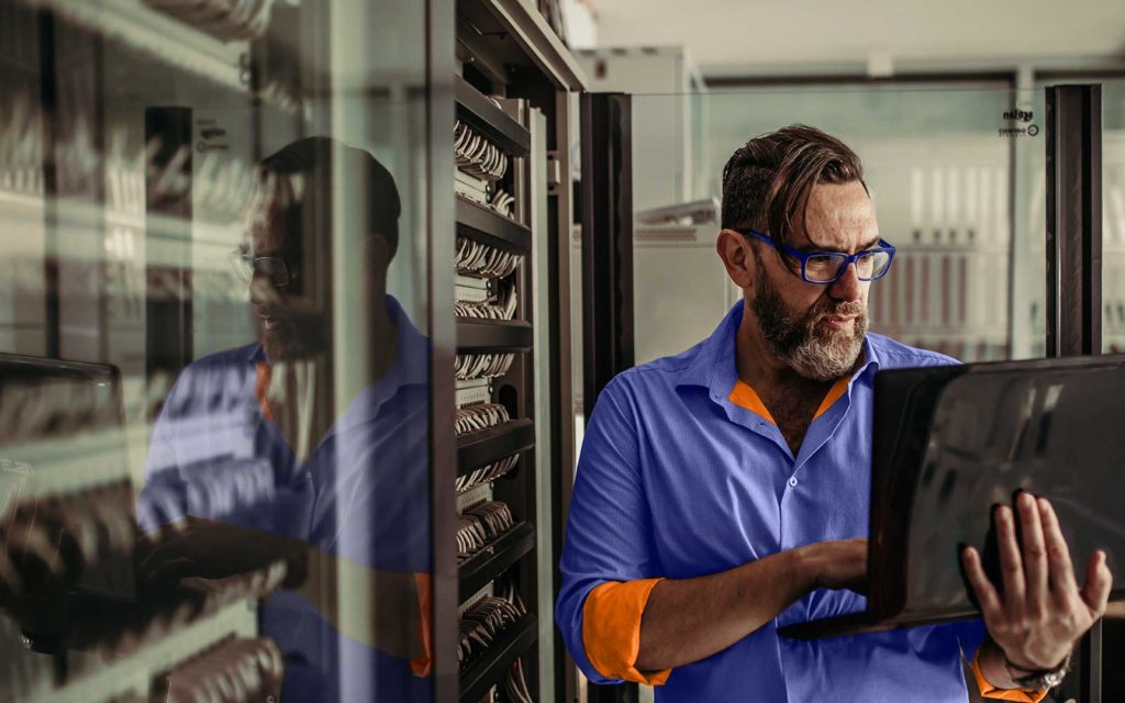 An edited stock feature image of a person representing an IT engineer. 